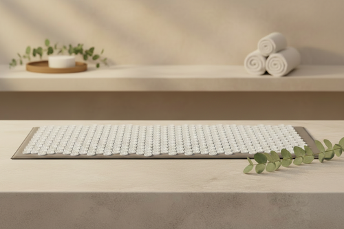 ReliefMat Acupressure Set with extra-long mat in a spa setting